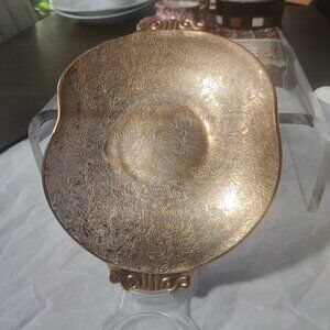 Gold over silver tray top, glass on bottom. Vintage serving tray for bon-bons.